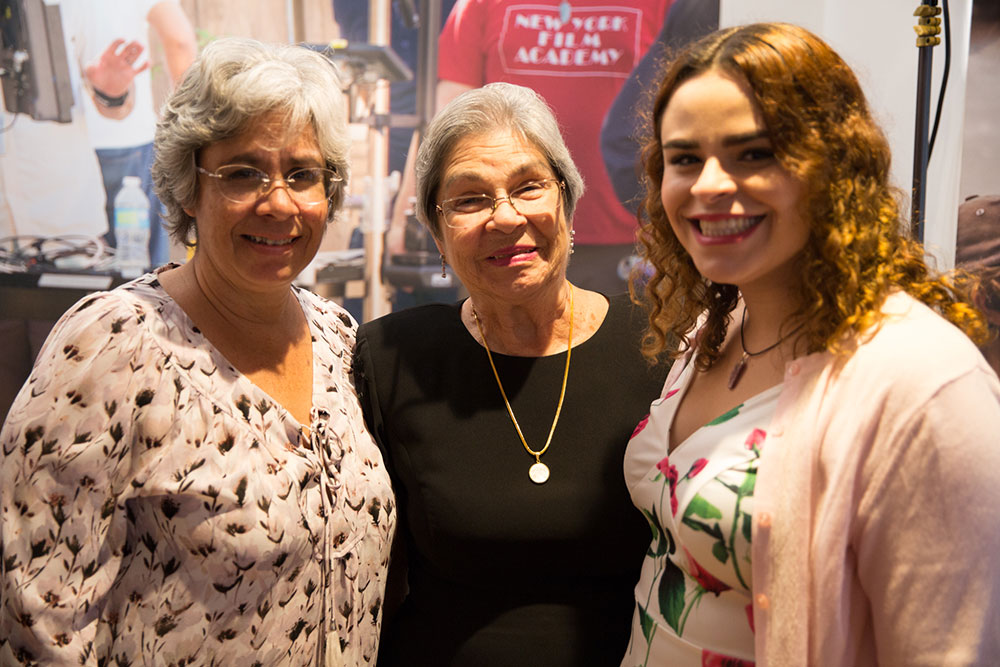 three people at the 2016 nyfa fall film commencement ceremony